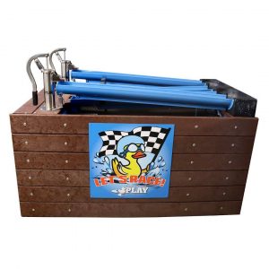 Lil’ Ducky Racing System – Interactive water play attraction featuring hand-powered pumps and a racing track for rubber ducks, designed for agritourism venues like pumpkin patches and farm parks.